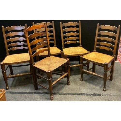 237 - A matched set of six ladder back dining chairs, woven rush seats - comprising a 19th century elm car... 