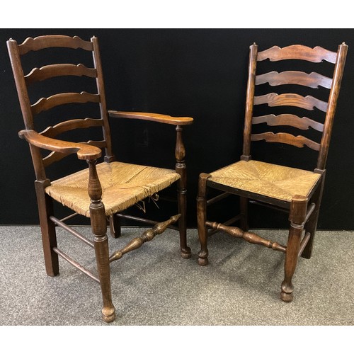 237 - A matched set of six ladder back dining chairs, woven rush seats - comprising a 19th century elm car... 