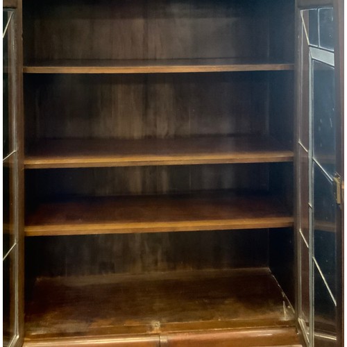 260 - An Art Deco oak lead glazed bookcase, c.1940