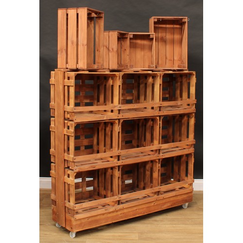 304 - A contemporary open packing crate display stand, 176.5cm high overall, 131cm wide, 36.5cm deep