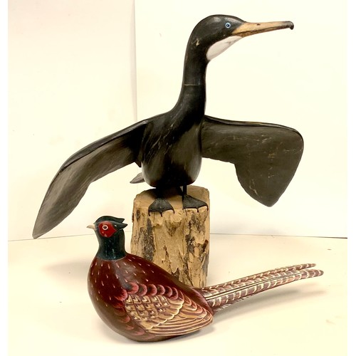 314 - Art Sculpture - a carved wood Cormorant, perched with wings extended, 50cm high x 51cm wide;  a carv... 