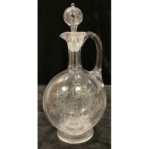14 - A late 19th century clear glass decanter, engraved with wyvern crest and foliate scrolls with beaded... 