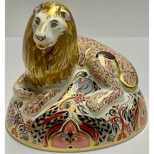 24 - A Royal Crown Derby paperweight, Lion, gold stopper, unboxed