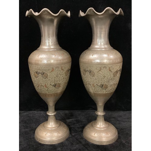 28 - A pair of Indian Bidri vases, wavy edge everted rim, ovoid decorated with Indian Elephants and birds... 