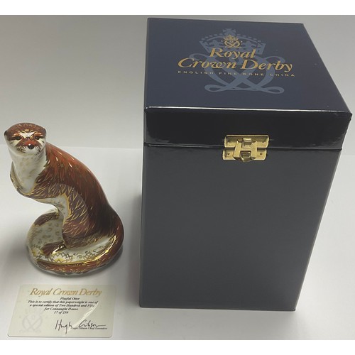 33 - A Royal Crown Derby paperweight, Playful Otter, for Connaught House, Limited Edition No.17 of 250, g... 
