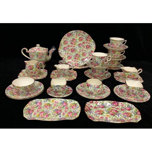 37 - A Royal Grimwades Summertime pattern chintz associated part tea set, comprising teapot, milk jug and... 