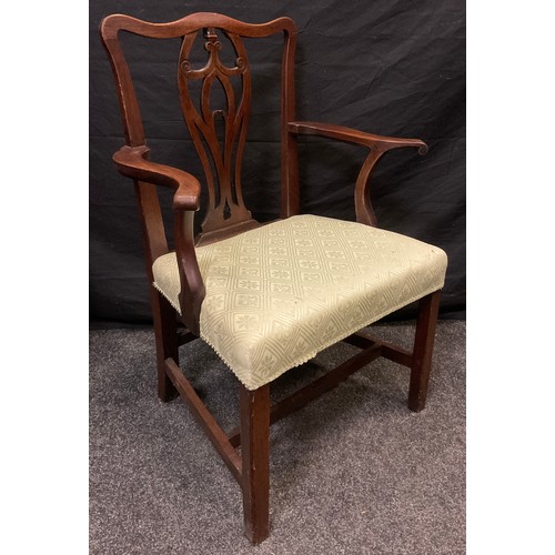 57 - A 19th century Chippendale style mahogany elbow chair, serpentine top rail, pierced and carved splat... 