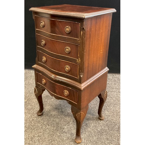 63 - A George III style reproduction mahogany side cabinet / chest of drawers, serpentine shaped front, t... 