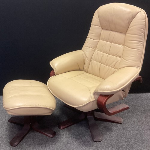 381 - An ‘Easy chair’ style recliner-swivel armchair, with matching footstool, cream leather, bent plywood... 