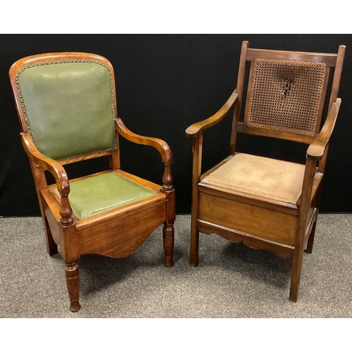 388 - A Victorian walnut commode elbow chair, green leather upholstered back and seat, turned legs and sup... 