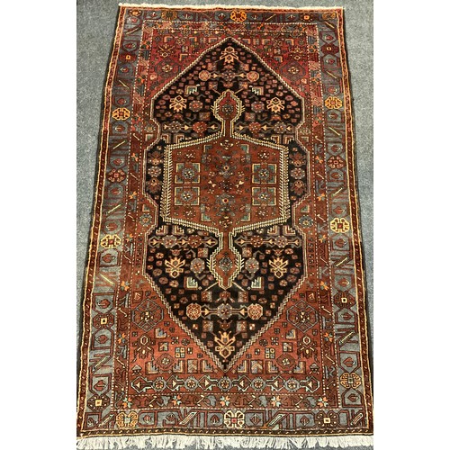 389 - A North west Persian Zanjan rug / carpet, 255cm x 152cm.