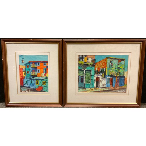 332 - Hector Dario Cauda, Street Scenes in Fauvist colours, signed, oils on board, (2).