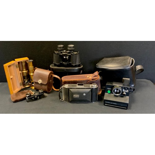 428 - A traveling student monocular microscope, cased, another;  pair of German Emi Baush Rathenau opera g... 