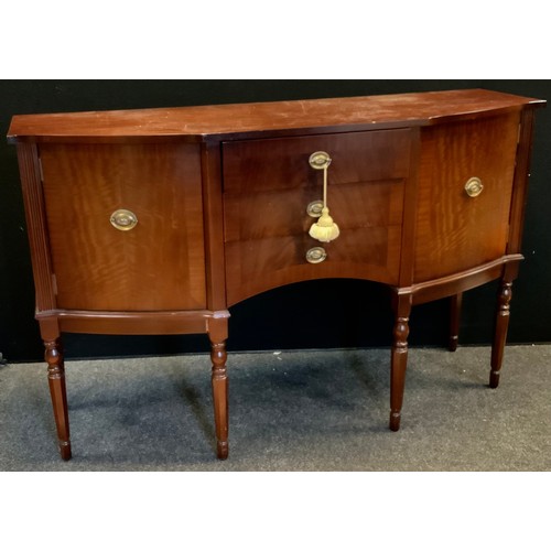 390A - A Reproduction mahogany breakfront sideboard, three central drawers flanked by slightly bowed cupboa... 