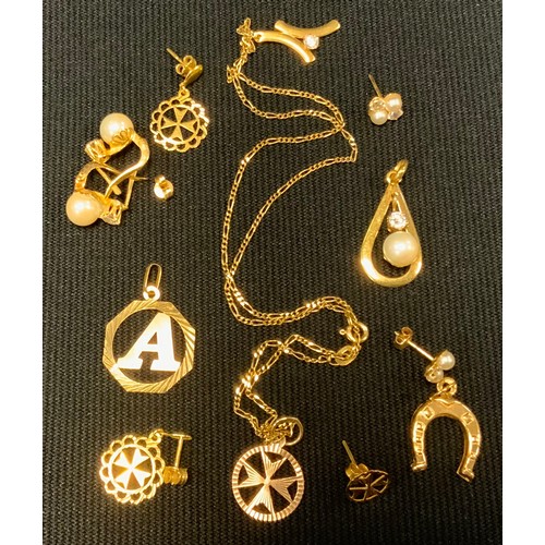 504 - A pair of yellow metal earrings, others simulated pearls, pendants, Maltese cross etc, all stamped 7... 