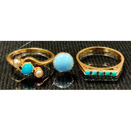 513 - A turquoise and seed pearl twist crest ring, 18ct gold shank, size O;  another straight, 18cct gold ... 