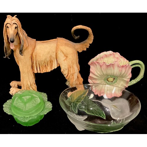 70 - A novelty teapot as a flower, 18cm; a resin model of a hound, 34cm; a green glass dish and cover, mo... 