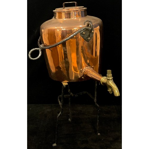 90 - A Victorian copper gypsy kettle, 48cm over iron suspension handle; a Georgian brass and iron trivet ... 