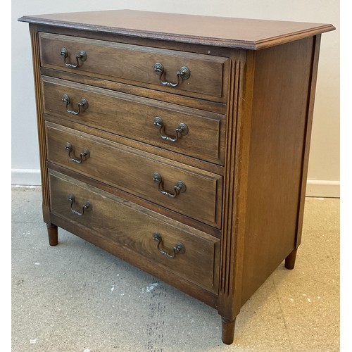 208 - A Walnut chest of drawers, cross-banded top, four graduated long drawers, turned feet,