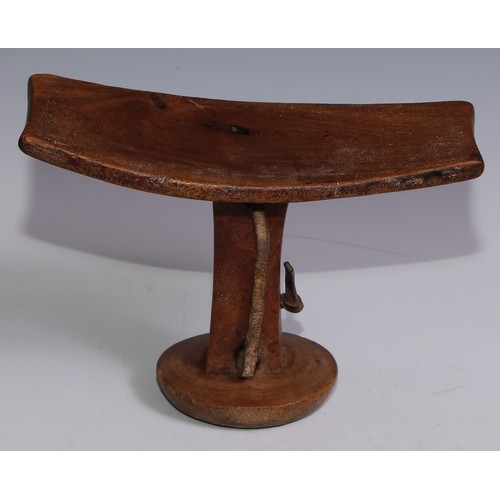 27 - Tribal Art - an Ethiopian headrest, 20.5cm wide; another (2)