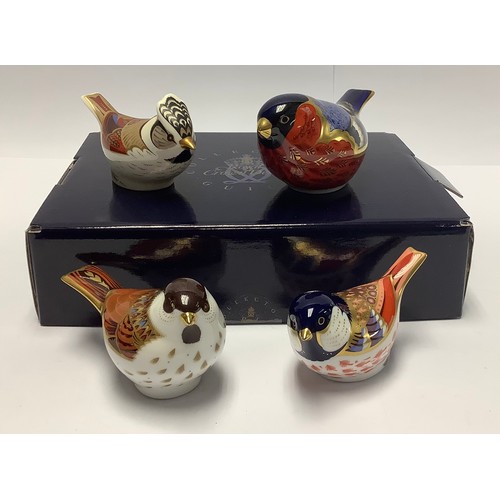 152 - A Royal Crown Derby paperweight, Crested Tit, Collector's Guild member's pack, gold stopper, boxed; ... 