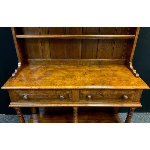 101 - A Pollard Oak Welsh Dresser in the manner of Rupert Griffiths, two tier plate rack top, pair of shor... 