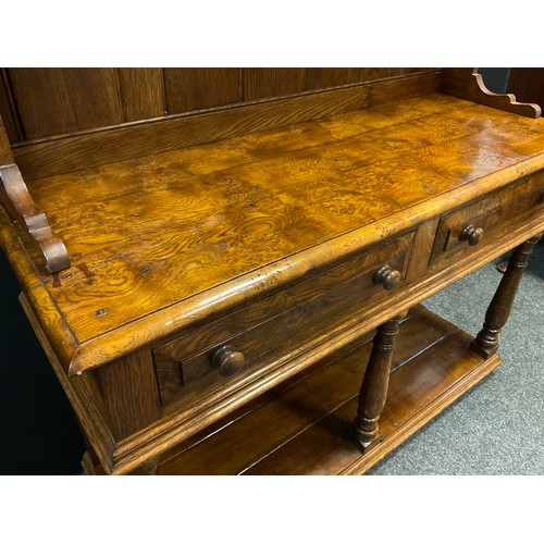 101 - A Pollard Oak Welsh Dresser in the manner of Rupert Griffiths, two tier plate rack top, pair of shor... 