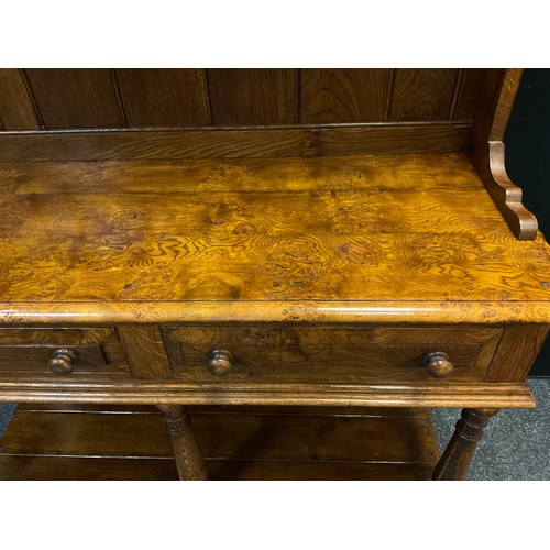 101 - A Pollard Oak Welsh Dresser in the manner of Rupert Griffiths, two tier plate rack top, pair of shor... 