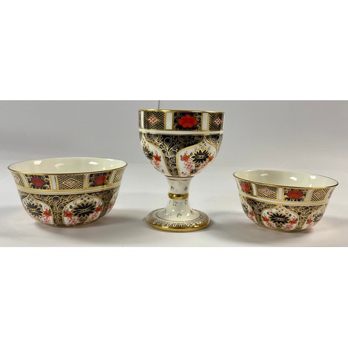 169 - A Royal Crown Derby Imari 1128 pattern goblet, first quality; a pair of 1128 graduated sugar bowls, ... 