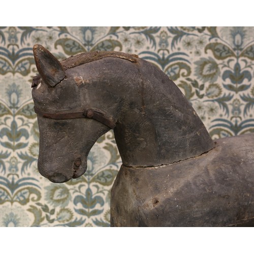 6057 - Folk Art - a late 19th century/early 20th century carved wooden Horse, naively carved throughout, re... 