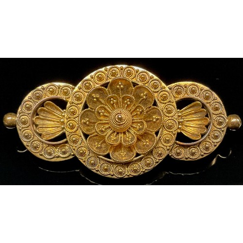 432 - A gold coloured metal three panel floral brooch, stamped 15ct, 7g gross