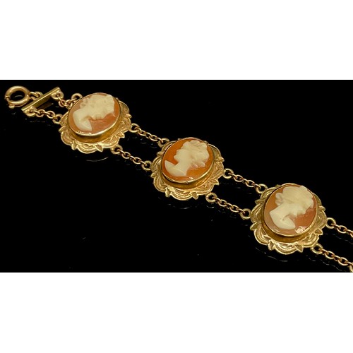 433 - A 9ct gold mounted seven panel cameo bracelet, stamped 375, 14.1g gross