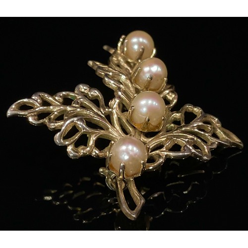 436 - A simulated pearl leaf brooch, gold plated mount, unmarked