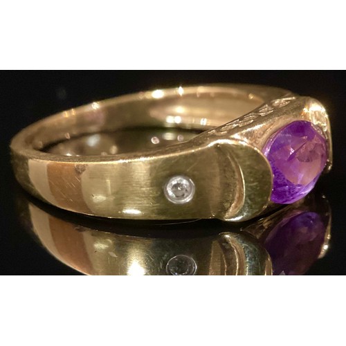 453 - A 9ct gold amethyst and diamond ring, oval amethyst, between tapering diamond inset shoulders, 9ct g... 