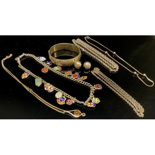 467 - Silver necklaces, bangle, chain with charms and a pair of earrings