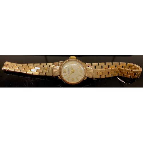 469 - A 9ct gold cased Lady's Bernes cocktail watch, 9ct gold brick link strap, 14.9g gross