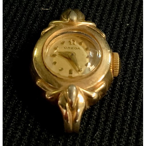 473 - A lady's gold coloured metal Omega wristwatch