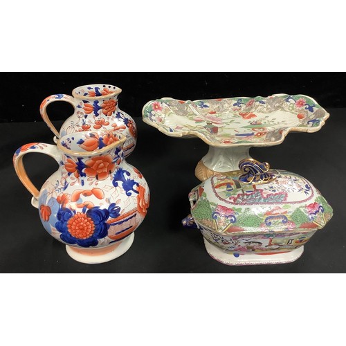 233 - A pair of 19th century Mason's Ironstone jugs, decorated in the Imari palette, impressed marks, 15cm... 