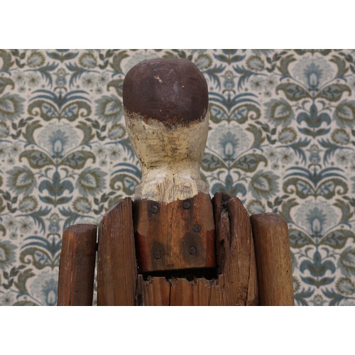 6070 - Folk Art - a good 19th century carved and painted wooden doll, the carved and painted wooden head in... 