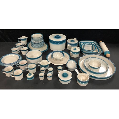 370 - A Wedgwood Blue Pacific pattern dinner and kitchen ware service, including two teapots, scallop shap... 