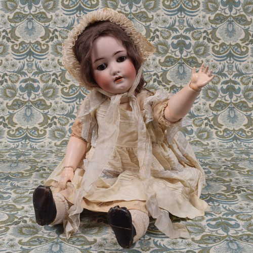 6075 - A German bisque head and painted ball jointed composition bodied doll, probably by Franz Schmidt, th... 