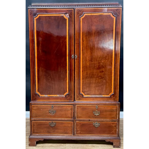 409 - A Sheraton Revival satinwood banded mahogany hanging press cupboard, formerly a linen press, pagoda ... 