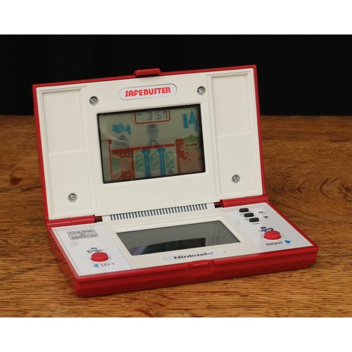 6103 - Retro Gaming & Technology - a Ninetendo Safebuster 'game and watch' multi screen device, model no.JB... 