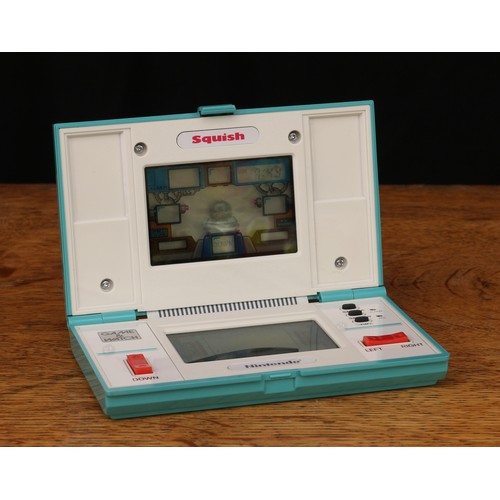 6108 - Retro Gaming & Technology - a Nintendo Squish 'game and watch' multi screen device, model no.MG-61, ... 