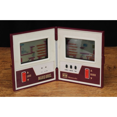 6106 - Retro Gaming & Technology - a Nintendo Mario Brothers 'game and watch' multi screen device, model no... 