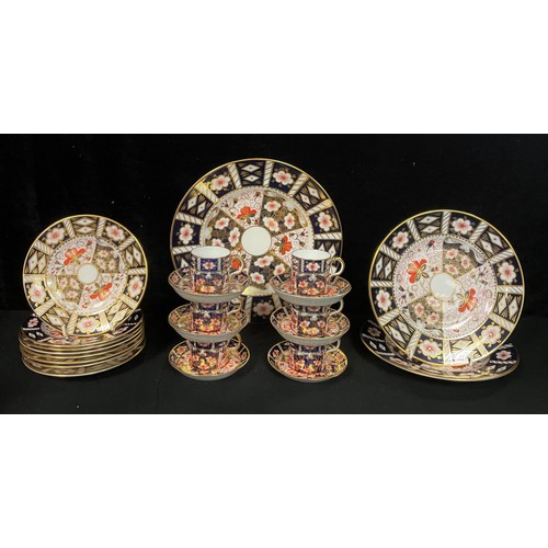 150 - A set of six Royal Crown derby Imari 2451 pattern coffee cans, saucers and side plates; a 2451 patte... 