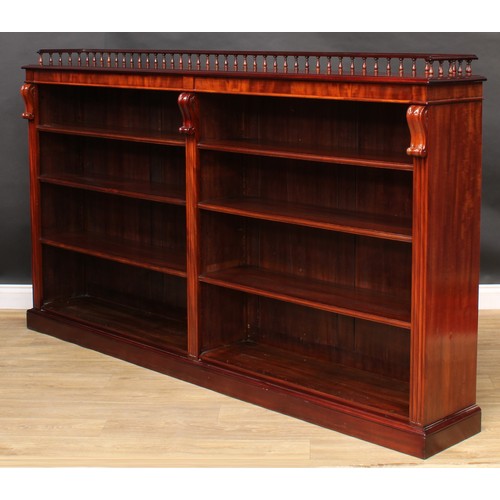 2206 - A Victorian mahogany low library bookcase, three quarter balustrade gallery above six adjustable she... 