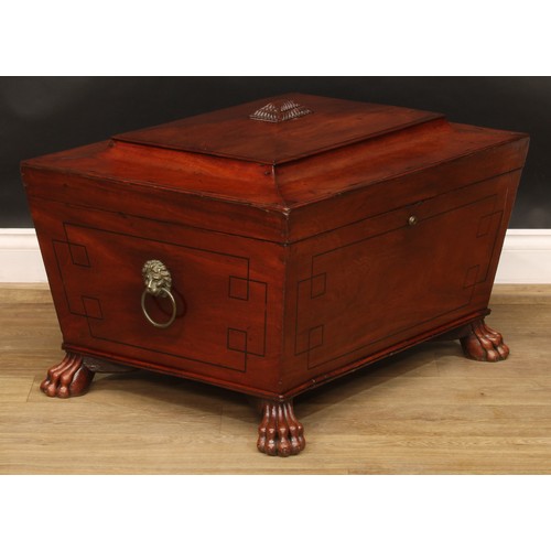 2207 - A Regency mahogany sarcophagus cellarette or wine cooler, hinged top enclosing a compartmented inter... 