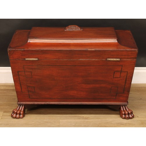 2207 - A Regency mahogany sarcophagus cellarette or wine cooler, hinged top enclosing a compartmented inter... 