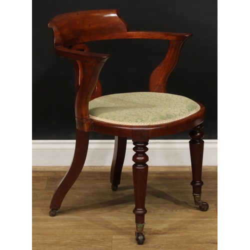 2209 - A Victorian mahogany desk chair, curved cresting rail, lyre-shaped splat, stuffed-over seat, turned ... 